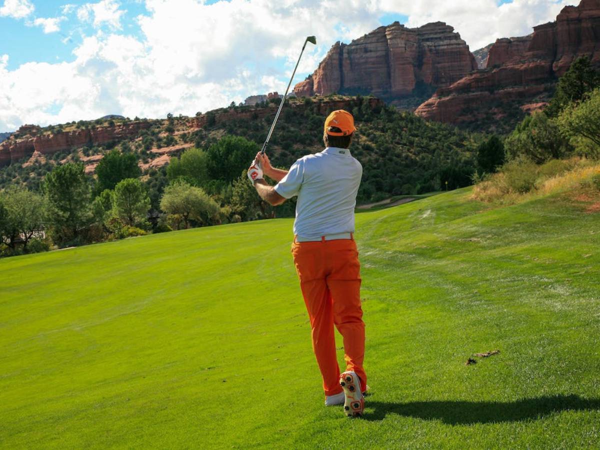 Man playing golf
