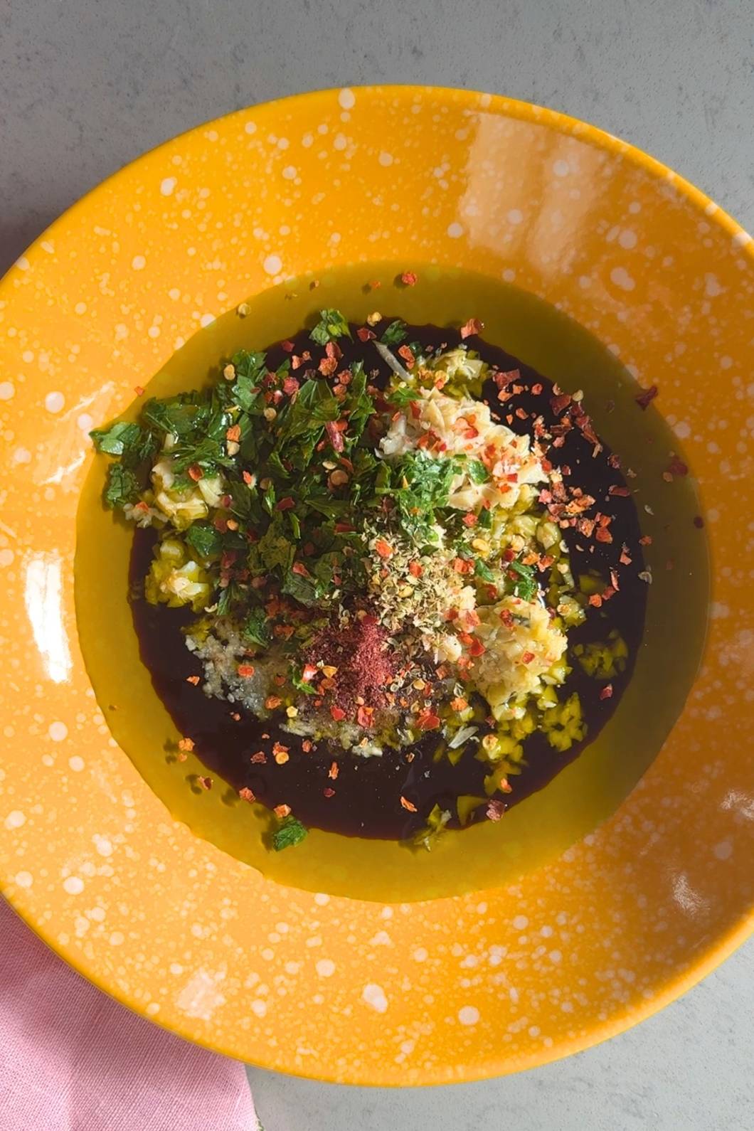 Italian Olive Oil and Balsamic Vinegar Bread Dip in yellow bowl