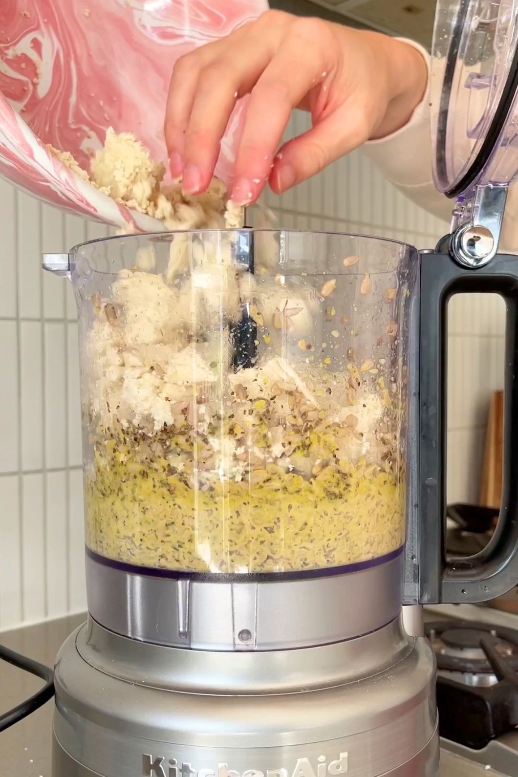 Add crumbled tofu to processor with mixture.