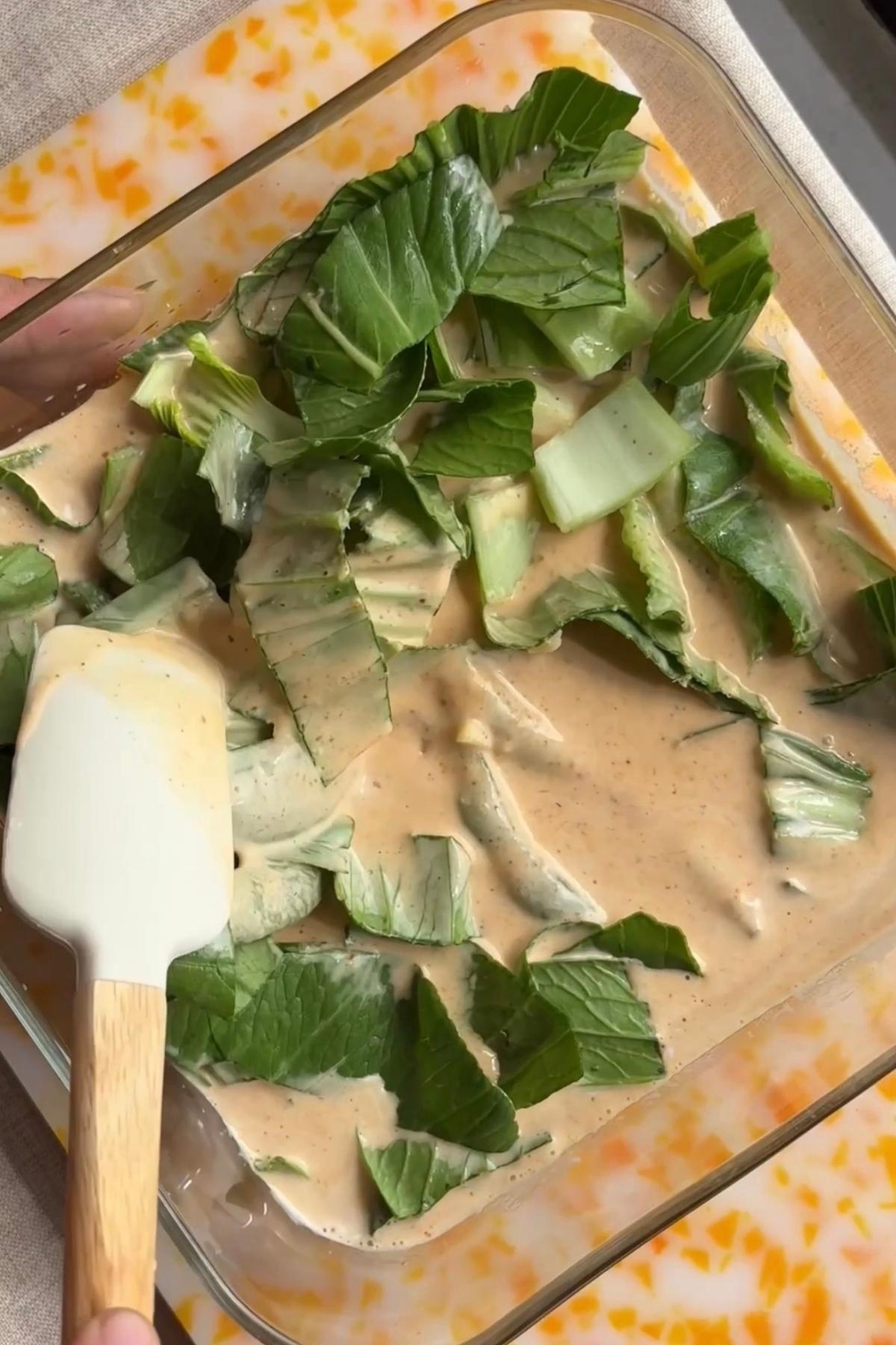 Chopped bok choy and frozen edamame added to the curry sauce and gently stirred to coat evenly.
