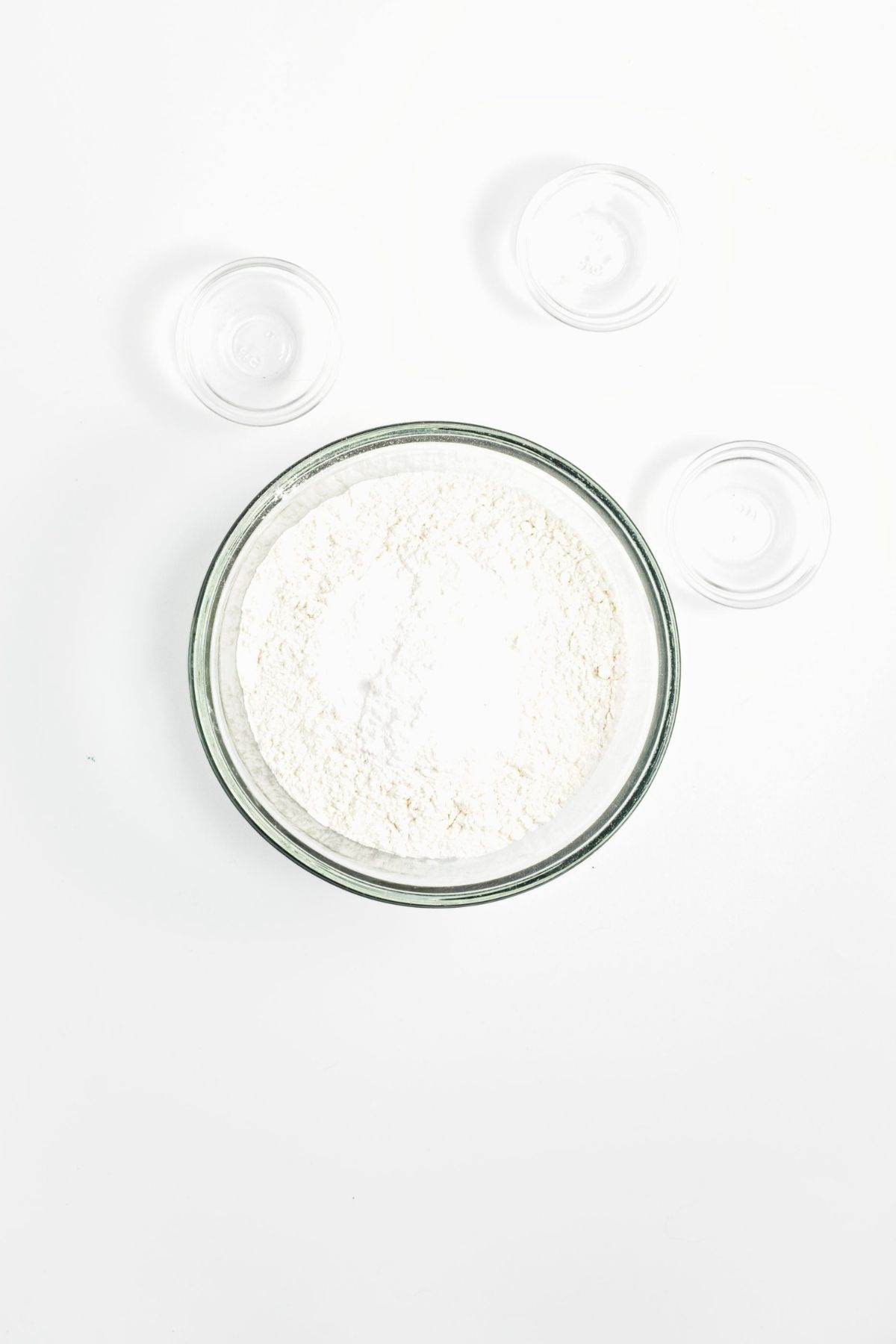 Dry ingredients mixed together in a large glass bowl.