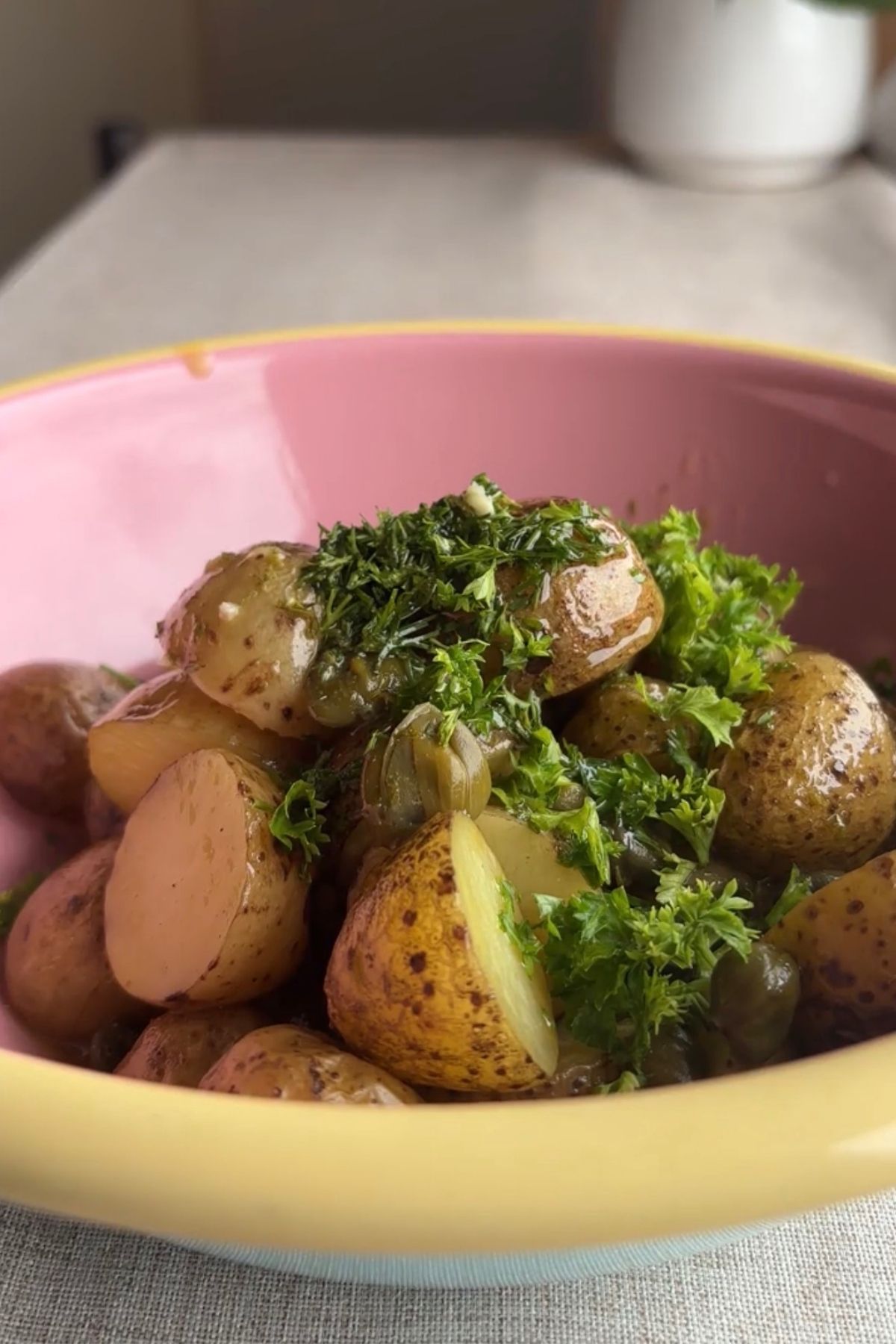 French potato salad gently tossed with crispy potatoes and fresh herbs