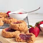 Strawberry almond thumbprint cookies with fresh strawberries and jam