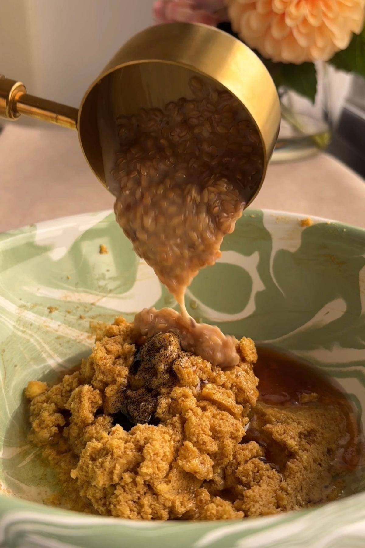 Flax mixture poured over brown sugar and vanilla in a bowl.