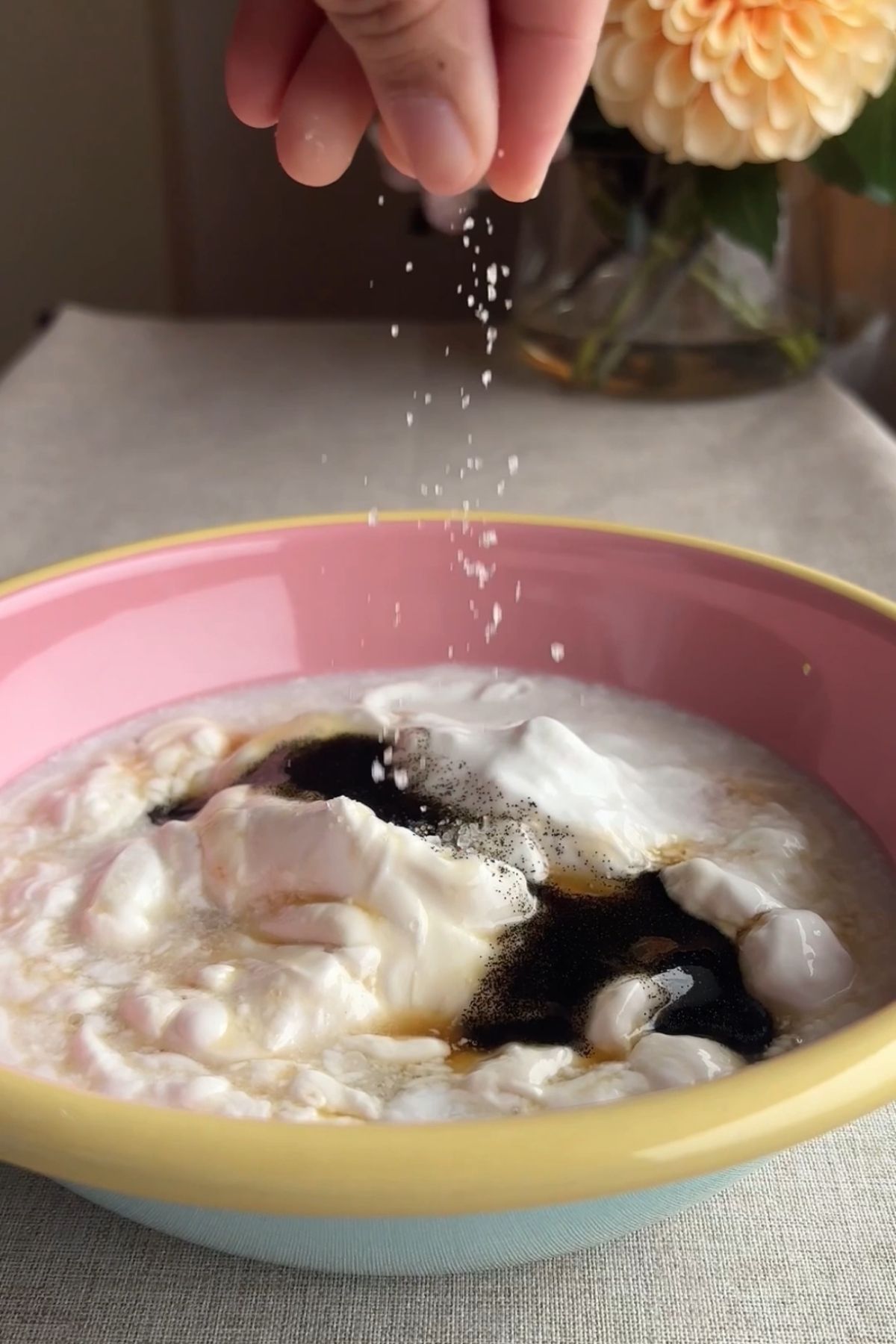 Maple syrup, vanilla bean paste, salt, and coconut cream in mixing bowl